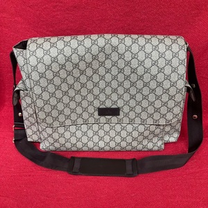 Gucci GG Supreme canvas changing/diaper bag, with multiple pockets, changing pad